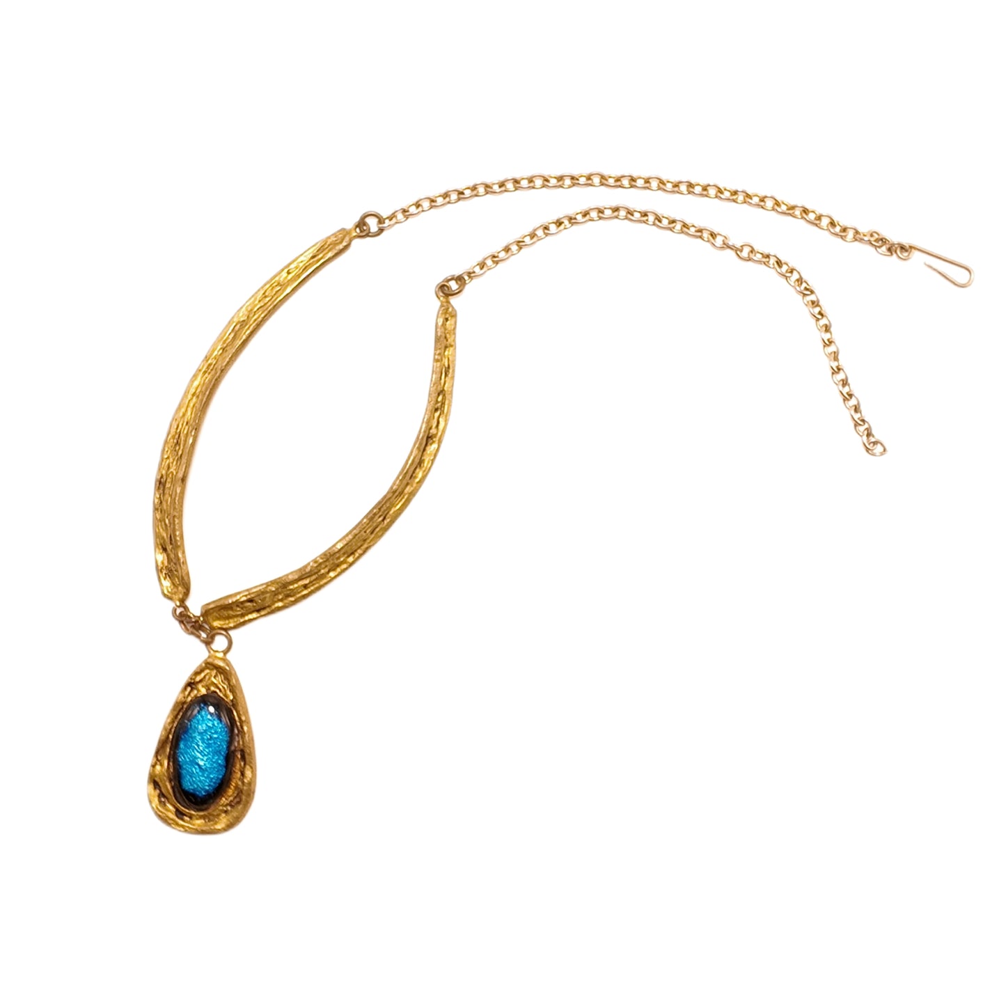 Vintage French 1960s blue necklace with oval shaped glass and unique design featuring a court retro style