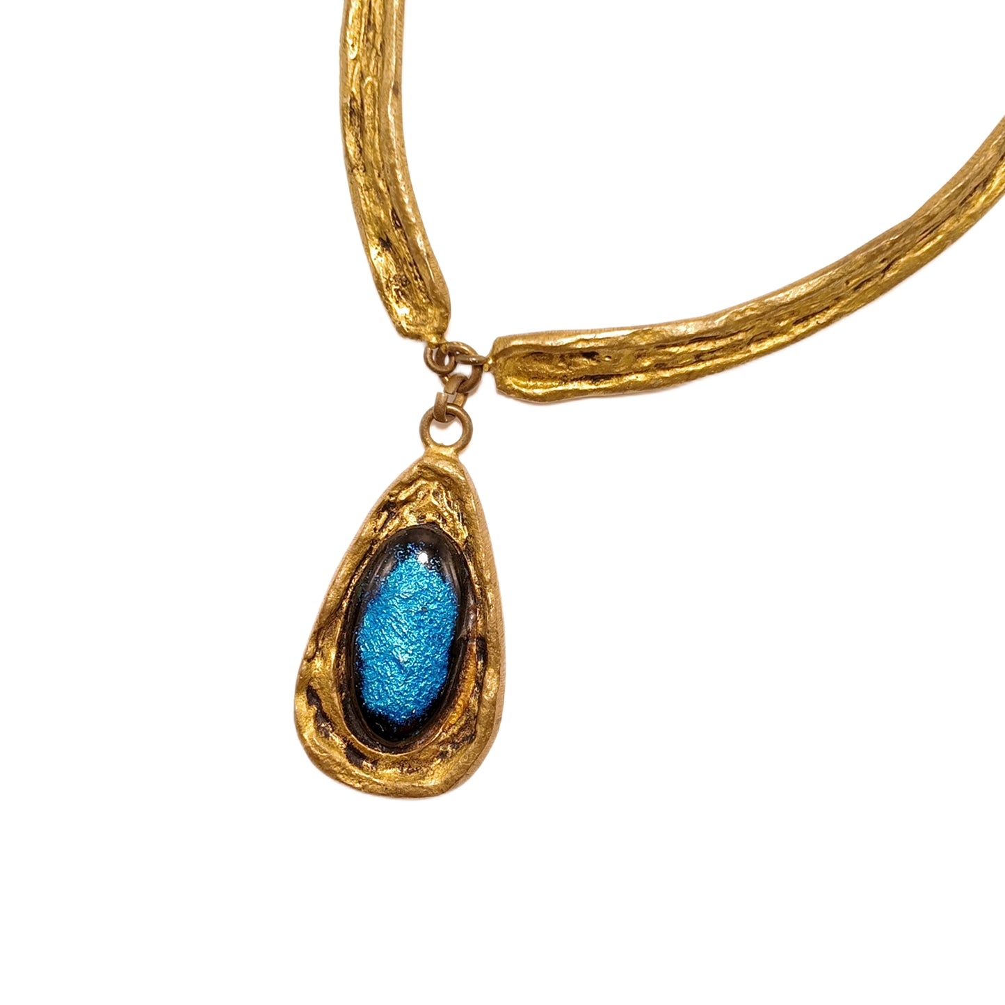 Vintage French 1960s blue necklace with oval shaped glass and unique design featuring a court retro style