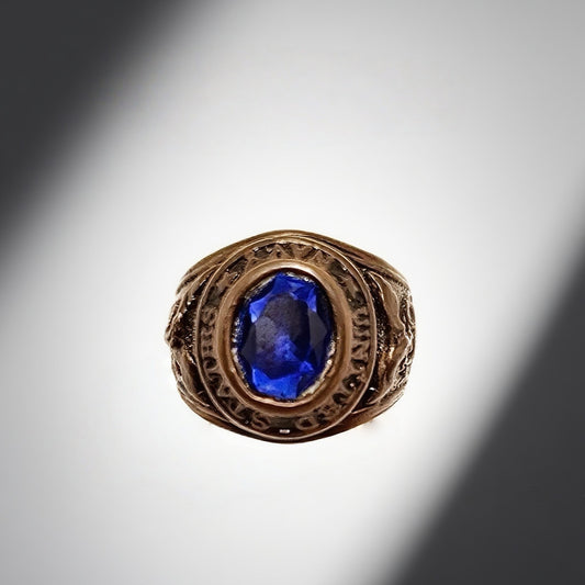 Vintage British 1960s Rhinestone brass ring with round letters engraved in the palace retro style