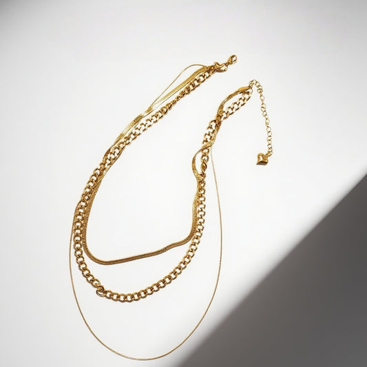 Vintage triple layered solid gold necklace with layered retro feel