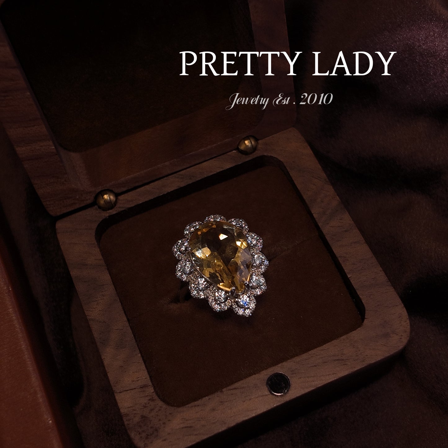Natural yellow crystal open ring S925 pure silver yellow water droplet shaped three-dimensional diamond setting surrounded by noble design palace retro