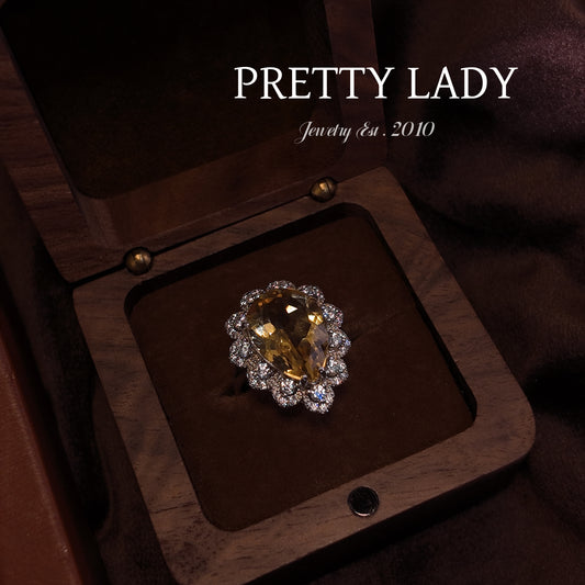 Natural yellow crystal open ring S925 pure silver yellow water droplet shaped three-dimensional diamond setting surrounded by noble design palace retro