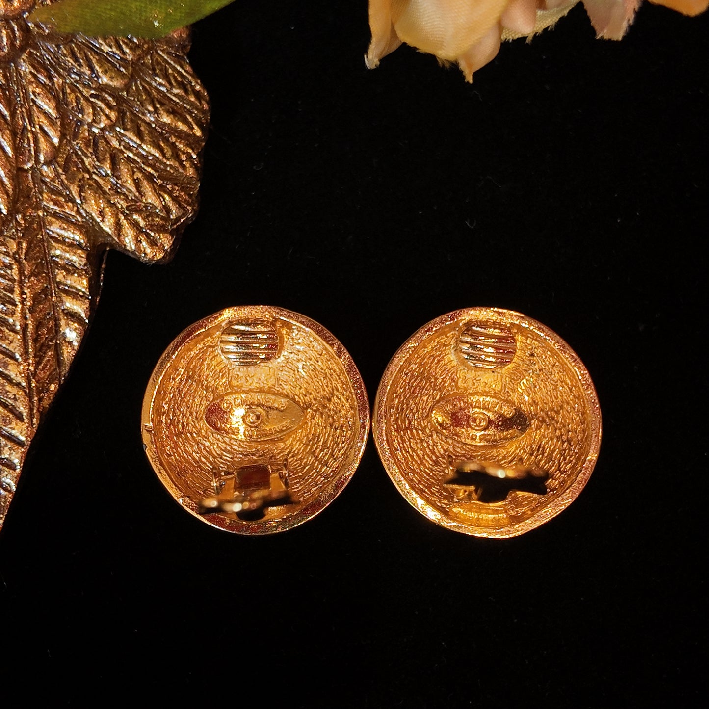 Vintage Chanel ear clip with classic double C diamond grid design court retro