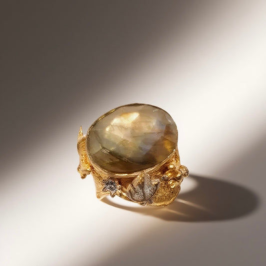 Vintage British 1960s natural stone brass ring with oval shaped three-dimensional coral surrounding the palace retro style