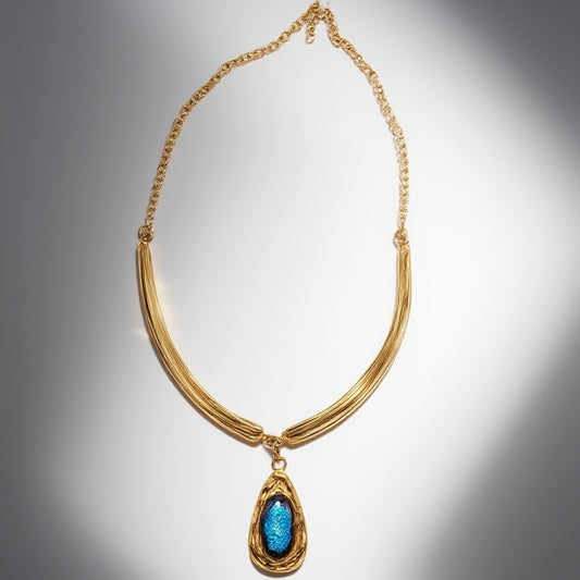 Vintage French 1960s blue necklace with oval shaped glass and unique design featuring a court retro style